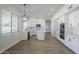 Modern kitchen with white cabinets, island and stainless steel appliances at 718 E Scorpio Pl, Chandler, AZ 85249