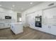 Modern kitchen with white cabinets, island and double ovens at 718 E Scorpio Pl, Chandler, AZ 85249