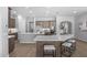 Stylish kitchen with double islands, stainless steel appliances, and ample cabinet space at 2134 W Rowel Rd, Phoenix, AZ 85085
