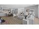 Living room showcasing the open layout, flowing seamlessly into dining and kitchen areas at 2134 W Rowel Rd, Phoenix, AZ 85085