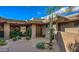 Desert home featuring landscaped front yard with a modern architectural design at 9216 E Sky Line Dr, Scottsdale, AZ 85262