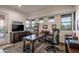 Spacious home office with neutral carpet, plenty of windows and a sturdy executive desk at 9216 E Sky Line Dr, Scottsdale, AZ 85262