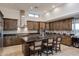 Spacious kitchen with custom cabinets, an island and stainless steel appliances at 9216 E Sky Line Dr, Scottsdale, AZ 85262