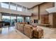 Inviting living room featuring a fireplace, piano, and cozy seating area at 9216 E Sky Line Dr, Scottsdale, AZ 85262