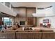 Open-concept living room with stylish decor, fireplace and plenty of natural light at 9216 E Sky Line Dr, Scottsdale, AZ 85262