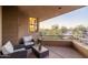 Covered patio area with comfortable seating and desert views, perfect for outdoor relaxation and entertaining at 9216 E Sky Line Dr, Scottsdale, AZ 85262