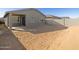 Large backyard with gravel and block wall at 16014 W Cottontail Ln, Surprise, AZ 85387