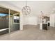 Dining room with sliding door to patio access at 16014 W Cottontail Ln, Surprise, AZ 85387