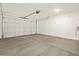 Spacious garage with automatic door opener at 16014 W Cottontail Ln, Surprise, AZ 85387