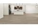 Open concept kitchen, stainless steel appliances, island at 16014 W Cottontail Ln, Surprise, AZ 85387
