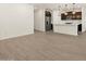 Modern kitchen with stainless steel appliances and island at 16014 W Cottontail Ln, Surprise, AZ 85387