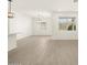 Open concept living room with large windows at 16014 W Cottontail Ln, Surprise, AZ 85387