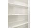 Walk in pantry with white shelves offering ample storage at 16014 W Cottontail Ln, Surprise, AZ 85387