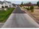 Long driveway leading up to a beautiful home in a rural location with mature trees and landscaping at 23325 S 132Nd St, Chandler, AZ 85249