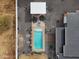 Aerial view of a backyard with a sparkling pool, covered seating area, and gravel landscaping at 23325 S 132Nd St, Chandler, AZ 85249