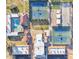 Aerial view of community amenities with tennis, bocce ball, and swimming pool, with meticulously kept green spaces at 4019 E Calypso Ave, Mesa, AZ 85206