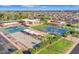 Extensive community amenities featuring tennis and bocce ball courts, a community center, and manicured landscaping at 4019 E Calypso Ave, Mesa, AZ 85206