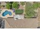 A close aerial shot shows the home's roof and outdoor entertaining area, including a pool at 4222 E Brown Rd # 31, Mesa, AZ 85205