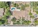 Overhead view of the home with a backyard pool, landscaping, and a well-maintained tile roof at 4222 E Brown Rd # 31, Mesa, AZ 85205