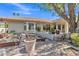 Well-maintained backyard featuring garden beds, gravel ground cover, and a view of the home's exterior at 4222 E Brown Rd # 31, Mesa, AZ 85205