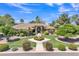Beautiful single-story home featuring a well-manicured front yard, fountain, and a decorative entry at 4222 E Brown Rd # 31, Mesa, AZ 85205