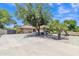 Three-car garage with an extensive driveway providing ample parking space and curb appeal at 4222 E Brown Rd # 31, Mesa, AZ 85205