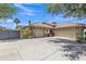 Three-car garage with an extensive driveway providing ample parking and easy access at 4222 E Brown Rd # 31, Mesa, AZ 85205