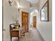 Hallway with arches and views into the bathroom at 4222 E Brown Rd # 31, Mesa, AZ 85205