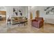 Comfortable living room features neutral colors, stylish decor, and tile flooring at 4222 E Brown Rd # 31, Mesa, AZ 85205