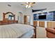 Main bedroom with decorative wall niches and a built in media center at 4222 E Brown Rd # 31, Mesa, AZ 85205