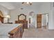Main bedroom with a decorative wall niche and vaulted ceilings at 4222 E Brown Rd # 31, Mesa, AZ 85205
