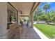 Covered patio with tiled floor, backyard views, and space for seating and entertaining at 4222 E Brown Rd # 31, Mesa, AZ 85205