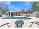 Pool and patio with outdoor seating overlooking the sparkling pool in the backyard at 4222 E Brown Rd # 31, Mesa, AZ 85205