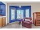 Comfortable sitting area in the main bedroom with large windows at 4222 E Brown Rd # 31, Mesa, AZ 85205