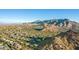 Aerial view showcasing a large community with mountain views at 11568 E Whispering Wind Dr, Scottsdale, AZ 85255