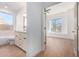 Clean bathroom with white vanity, bathtub and separate shower at 11568 E Whispering Wind Dr, Scottsdale, AZ 85255