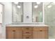 Modern bathroom with double vanity and walk-in shower at 11568 E Whispering Wind Dr, Scottsdale, AZ 85255