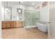 Modern bathroom with double vanity and large shower at 11568 E Whispering Wind Dr, Scottsdale, AZ 85255