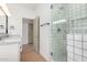 Spa-like bathroom with double vanity and glass shower at 11568 E Whispering Wind Dr, Scottsdale, AZ 85255