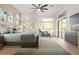 Spacious bedroom with large windows and sitting area at 11568 E Whispering Wind Dr, Scottsdale, AZ 85255