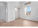 Spacious bedroom with large window and mountain views at 11568 E Whispering Wind Dr, Scottsdale, AZ 85255