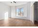 Bright bedroom with wood flooring and window seat at 11568 E Whispering Wind Dr, Scottsdale, AZ 85255
