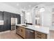 Modern kitchen with a large island and stainless steel appliances at 11568 E Whispering Wind Dr, Scottsdale, AZ 85255