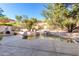 Private pool and waterfall feature in backyard at 11568 E Whispering Wind Dr, Scottsdale, AZ 85255