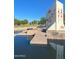 Unique water feature with native artwork and reflecting pool at 1817 N 77Th St, Scottsdale, AZ 85257