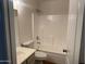 A well-lit bathroom featuring a shower-tub combo at 3922 N Creosote Ct, Casa Grande, AZ 85122