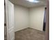A simple carpeted bedroom with no furniture at 3922 N Creosote Ct, Casa Grande, AZ 85122