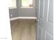 Comfortable bedroom featuring new wood floors, natural light, and neutral paint at 4512 W Stoneman Dr, Anthem, AZ 85086