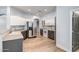 Bright, spacious kitchen featuring stainless steel appliances and white and grey cabinetry at 4512 W Stoneman Dr, Anthem, AZ 85086