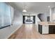 Open-concept living space with sliding glass doors leading to the outdoor living area at 4512 W Stoneman Dr, Anthem, AZ 85086